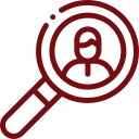 Magnifying glass with a person in the lens signifying background checks